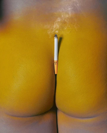 Surreal painting of a cigarette on a yellow surface, creating a minimalist yet suggestive image with abstract and sensual undertones.