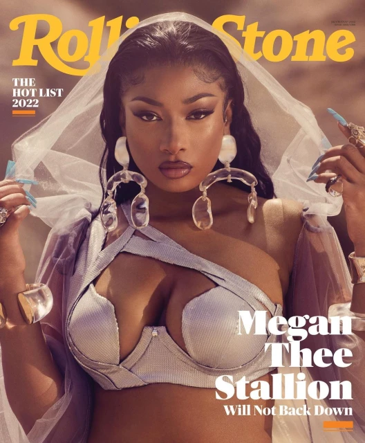Rolling Stone cover featuring Megan Thee Stallion in a metallic bra and sheer veil, accessorized with large earrings and rings.