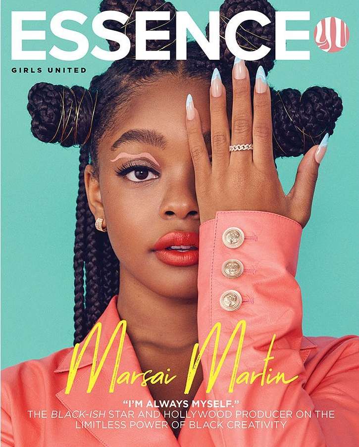 Essence magazine cover featuring model Marsai Martin with pink eyeshadow and light blue-tipped nails, posing in front of light blue background.