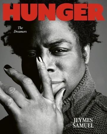 Black and white close-up of Jeymes Samuel on the cover of Hunger Magazine, hand to face, dark hair, wearing a textured sweater.