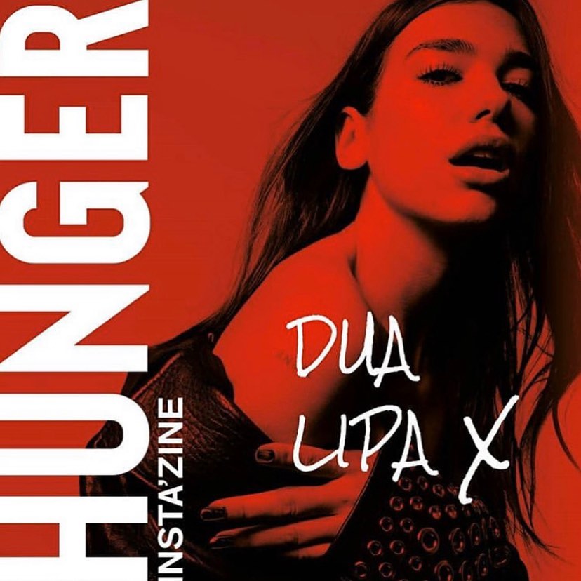 Dua Lipa poses in a striking studio shot for Hunger Insta'zine with red tones and bold white text, highlighting fashion and beauty.