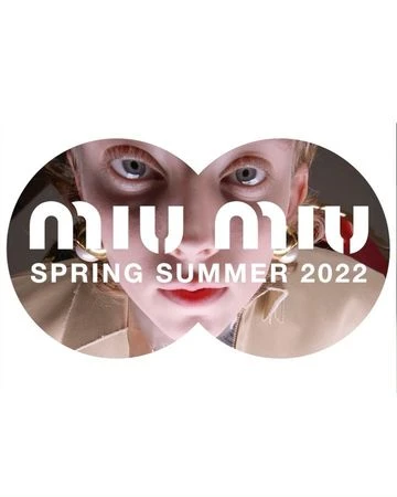 Miu Miu spring/summer 2022 campaign featuring a close-up of a model's face with large logo text overlay in a white circular frame.
