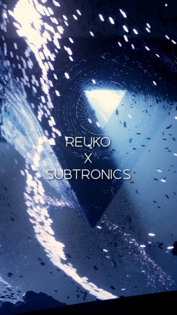 Abstract CGI animation with geometric shapes, particle effects, and the text "REUKO X SUBTRONICS" in a dynamic, blue-toned scene.