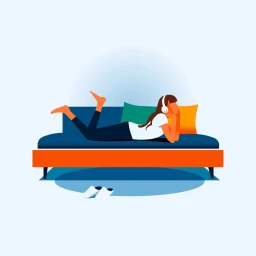 Digital illustration of a person wearing headphones lying face down on a blue sofa with colourful pillows