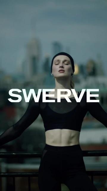 An adult female in black athletic wear stands in front of a cityscape with her arms outstretched and the word "SWERVE" overlaid.