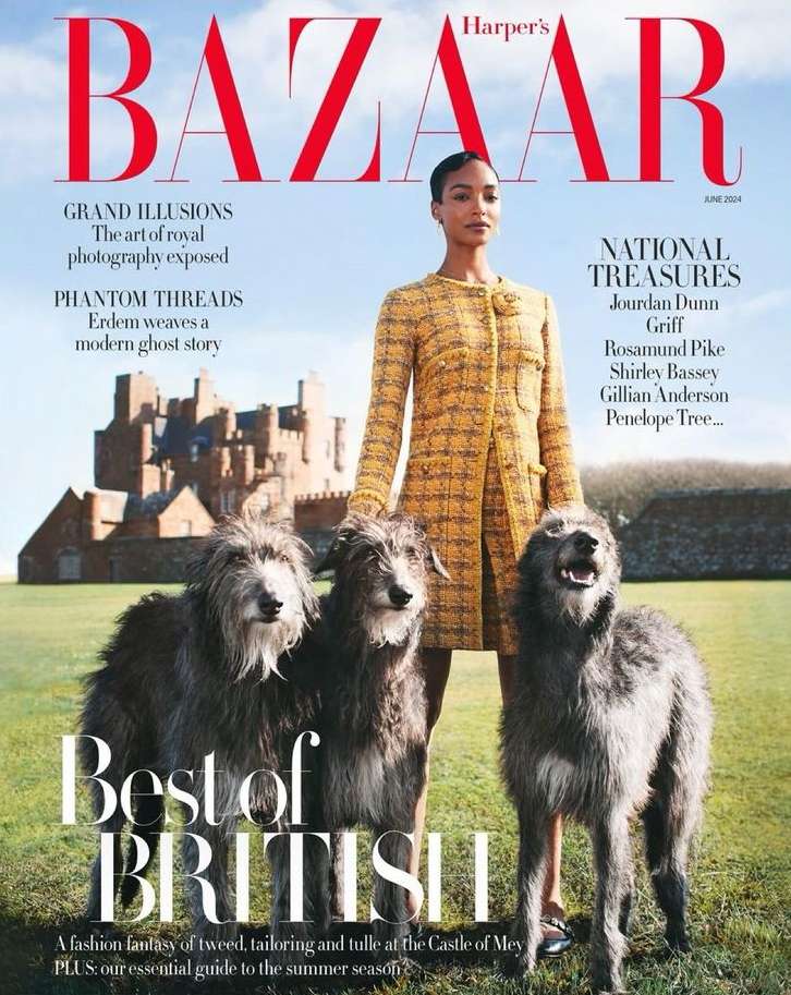 Magazine cover featuring Jourdan Dunn in tweed, with three Irish Wolfhounds and castle backdrop, Harper's Bazaar.