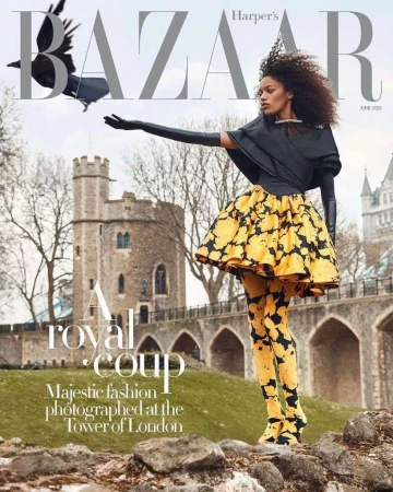 Fashion editorial featuring a Black model in a black and yellow dress, with the Tower of London and a raven in the background.
