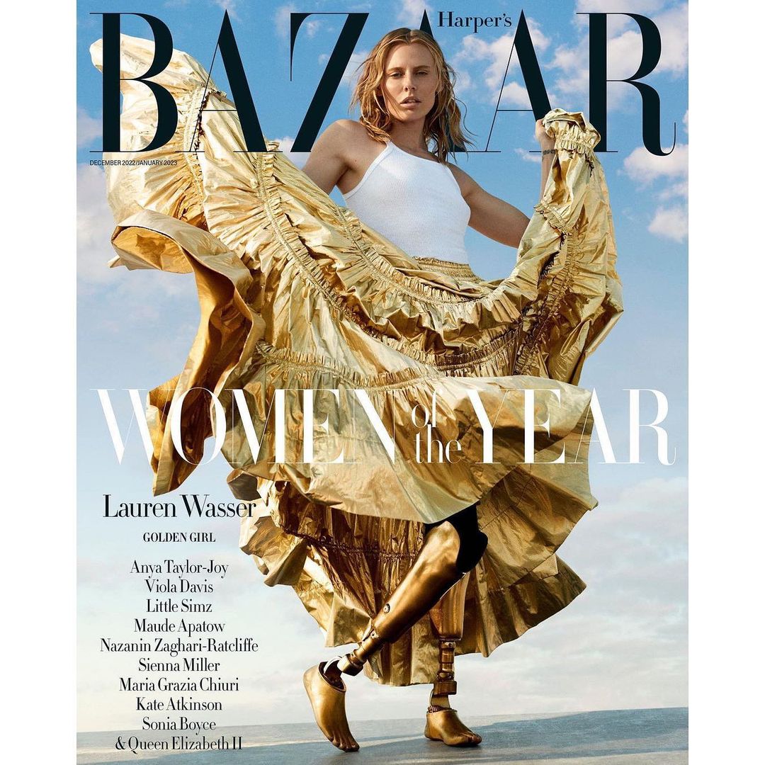 Magazine cover featuring Lauren Wasser in gold dress, Harper's Bazaar December 2023 issue, fashion and celebrity entertainment, model.
