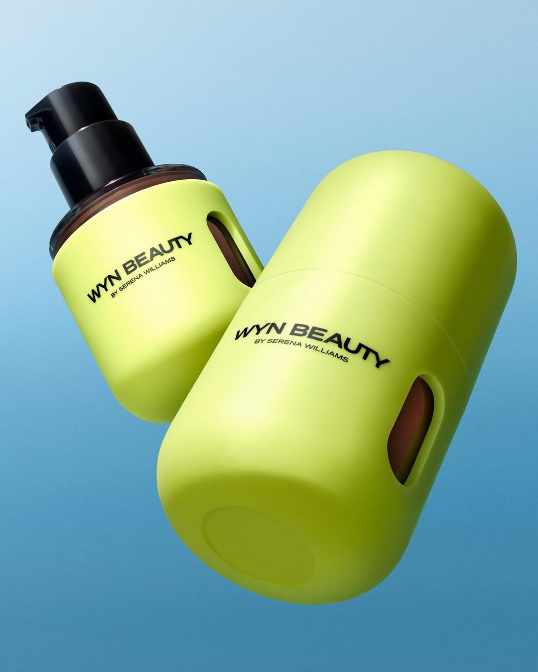 Two Wyn Beauty by Serena Williams products in chartreuse yellow are displayed against a blue gradient background in a product shot.