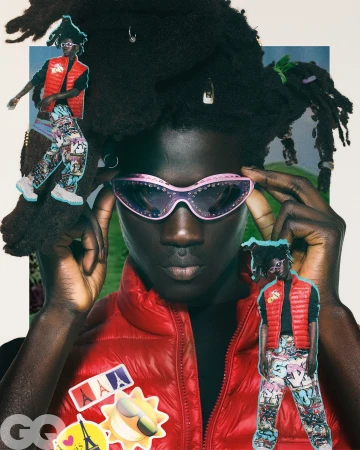 Portrait of a black man wearing pink sunglasses and a red puffer vest, with collage elements in a vertical frame.