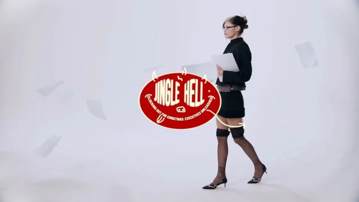 An adult female walks in a bright studio, wearing a black skirt suit, stockings, and heels, holding papers next to a Jingle Hell graphic.