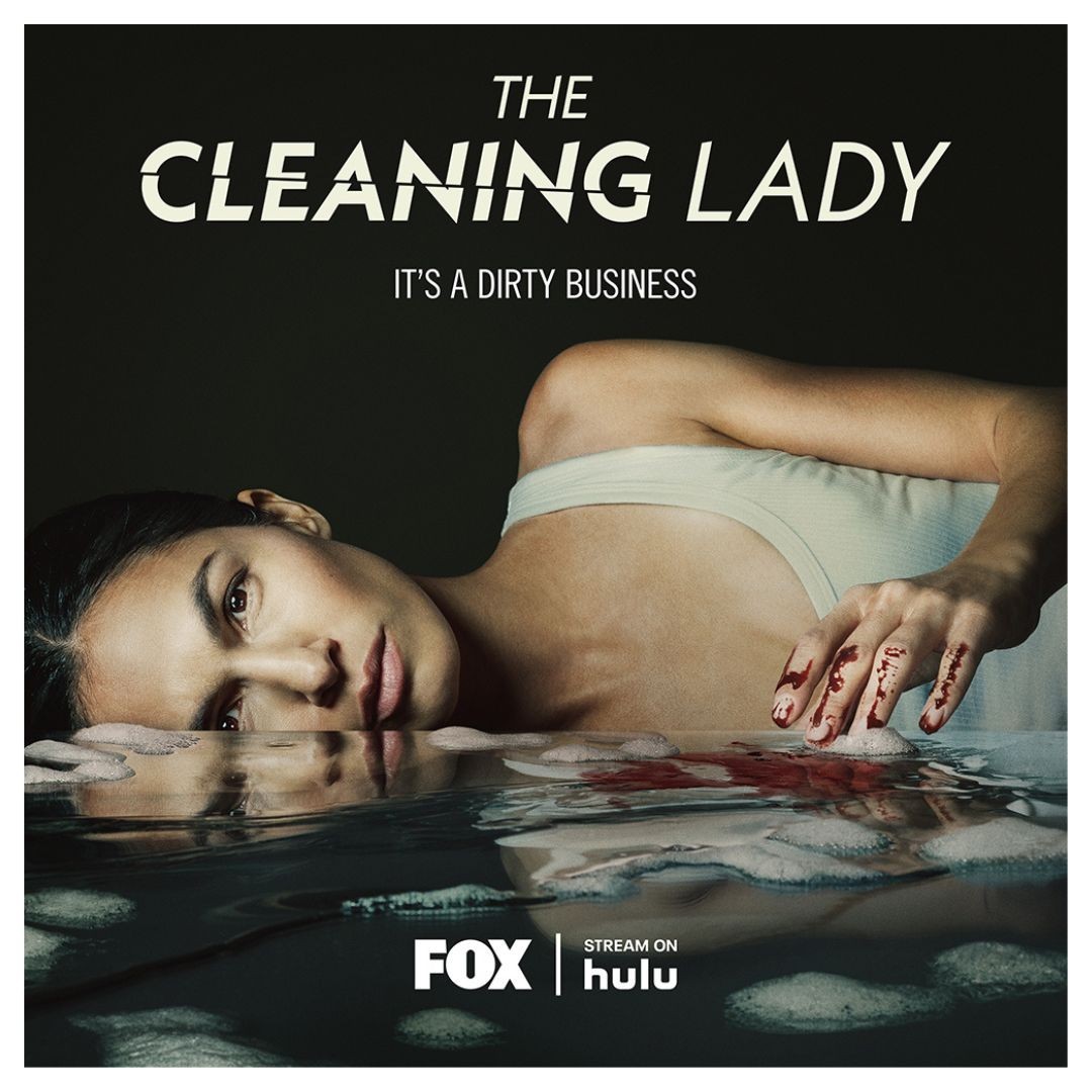 Promotional image for “The Cleaning Lady” featuring a woman lying near water with a dark background and blood on her hands.