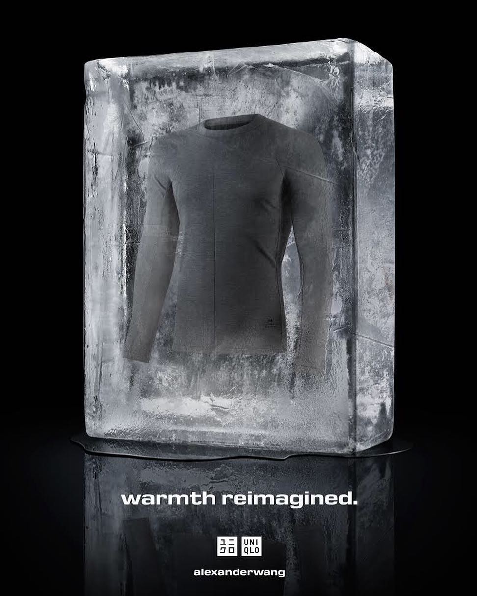 Long-sleeved shirt encased in a block of ice, photographed in a studio setting. The cool tones of the ice contrast with the dark background.