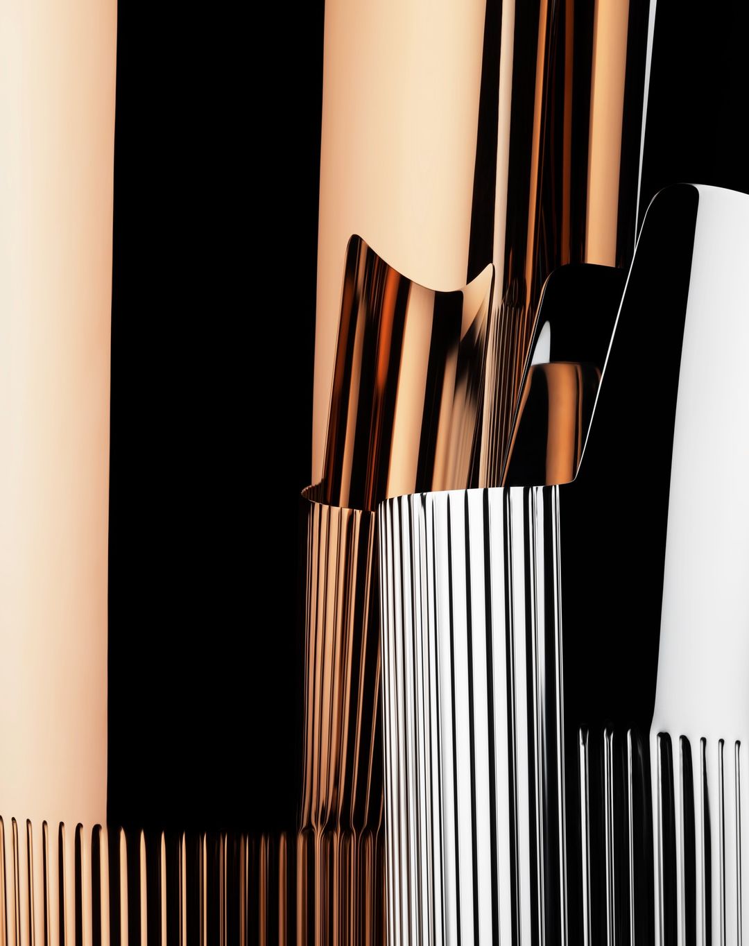 Abstract shot of rose gold and silver metallic vases with a ribbed texture, creating a modern, reflective design on a black background.