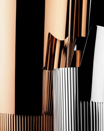 Abstract shot of rose gold and silver metallic vases with a ribbed texture, creating a modern, reflective design on a black background.