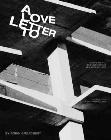 Abstract black and white architecture with stark white text overlay, reading 'A Love Letter' against structural beams and concrete.