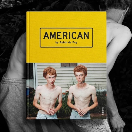 Book cover featuring two shirtless young men with red hair standing in front of a house, with another book titled AMERICAN.