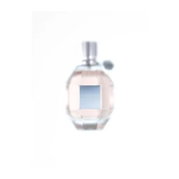 Close-up product photograph of a faceted glass perfume bottle with pale liquid on a white background by Rowan Fee.