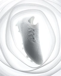 White sports shoe suspended inside a swirling abstract tunnel of white material photographed by Rowan Fee