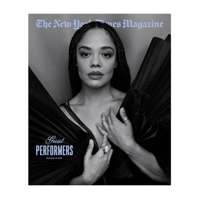 Black and white portrait of actress Tessa Thompson on The New York Times Magazine cover. She poses in a black dress and jewelry.