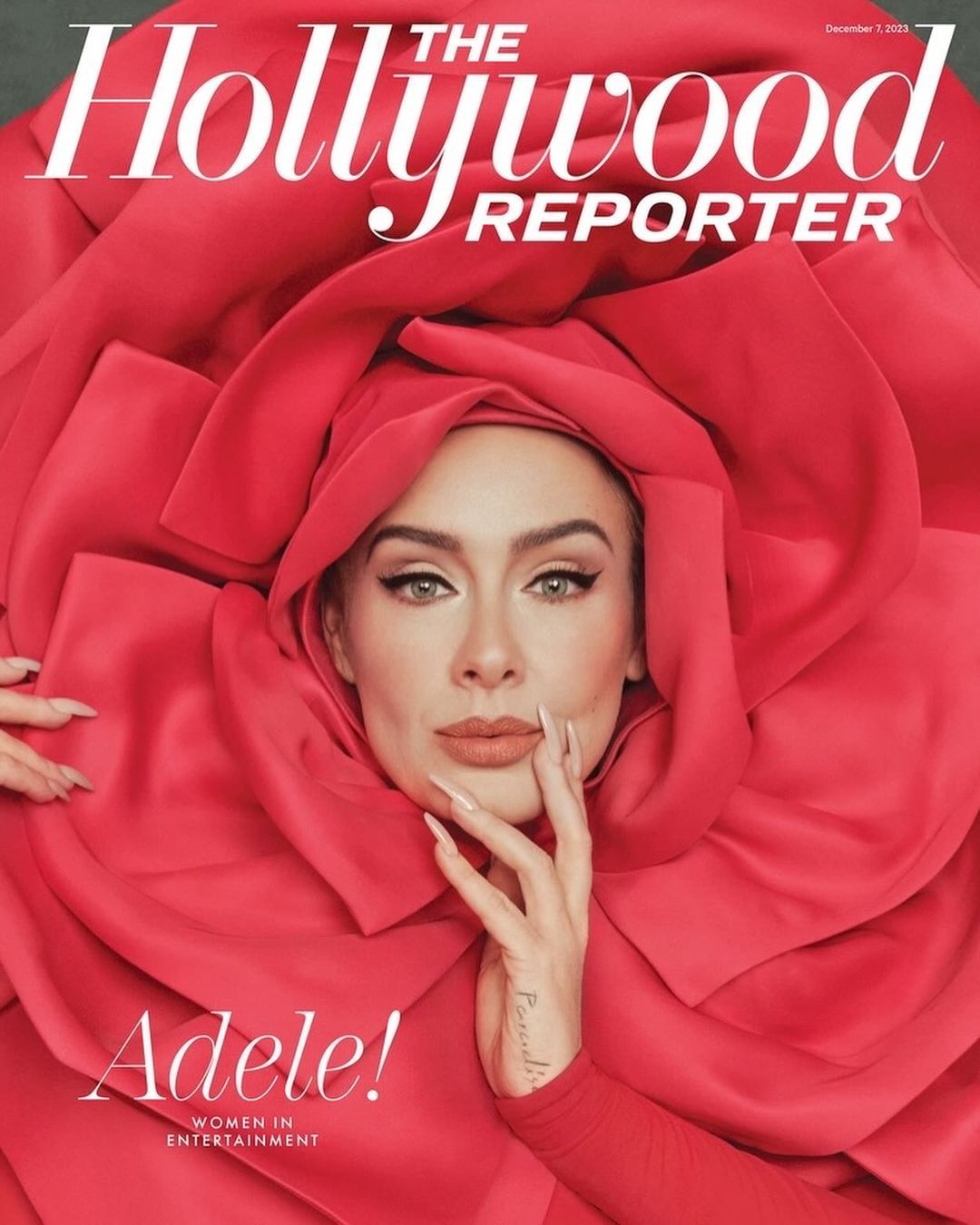 The Hollywood Reporter magazine cover featuring Adele, framed by red rose petals, promoting 'Women in Entertainment'.