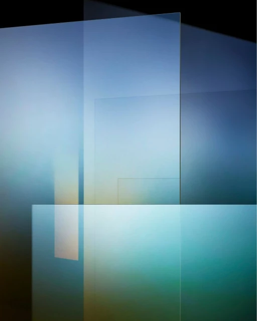 Abstract composition of overlapping transparent planes with a gradient of teal and blue, creating a modern, ethereal aesthetic.