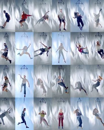 Montage showcases twenty-four diverse individuals suspended by wires against wavy white backdrop, captured with bright studio lighting.