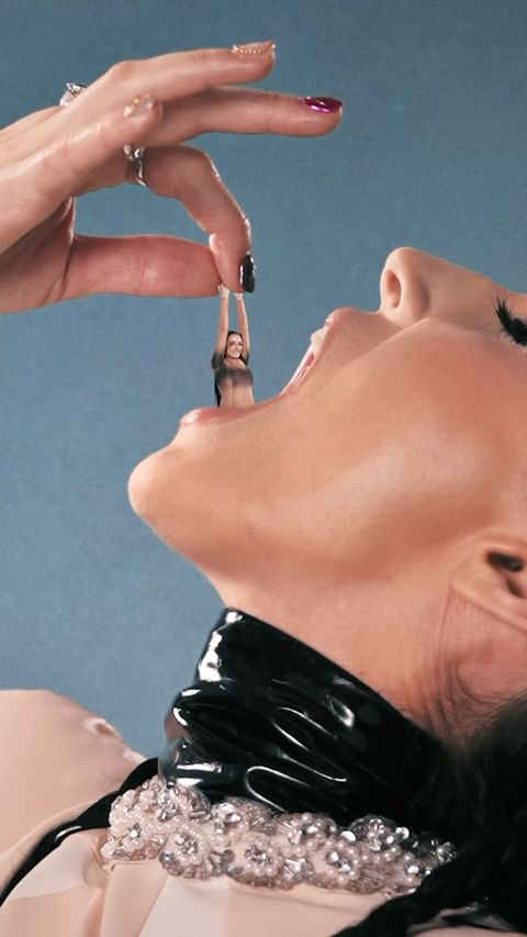 Abstract image featuring a woman's face and hand; a tiny woman is being lowered into her mouth by a manicured hand.