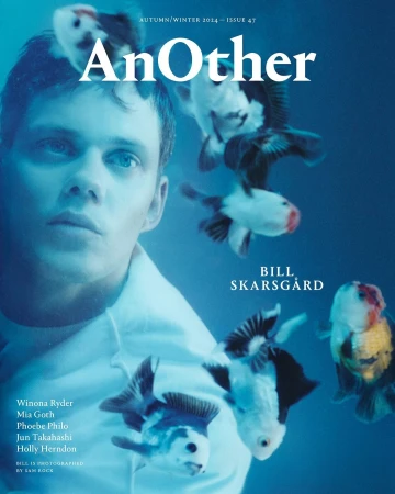 Magazine cover featuring a man surrounded by fish. The magazine's title, AnOther, is prominently displayed, along with other cover text.