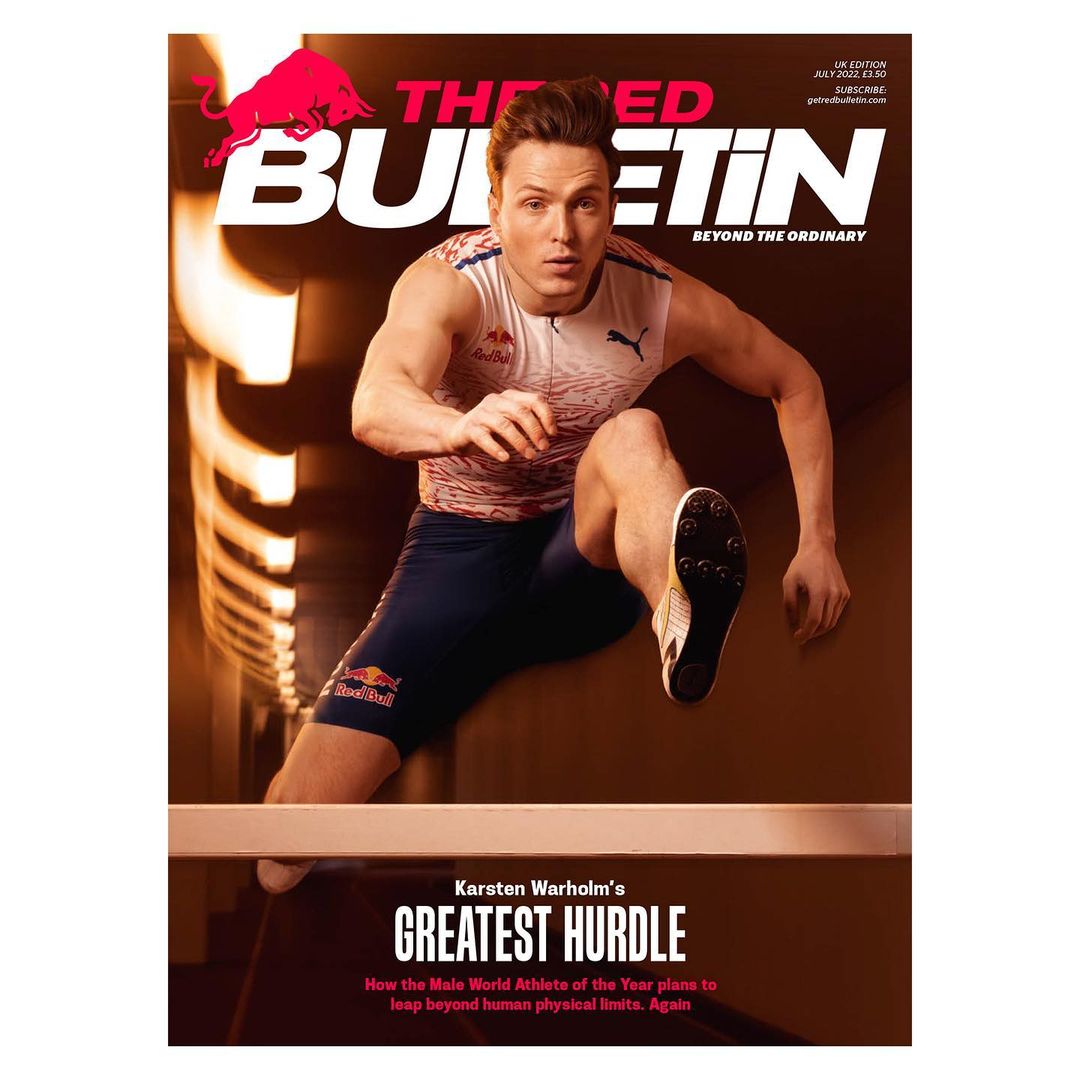 Magazine cover featuring Karsten Warholm jumping a hurdle, Red Bulletin logo, capturing dynamic athleticism and sports achievement.
