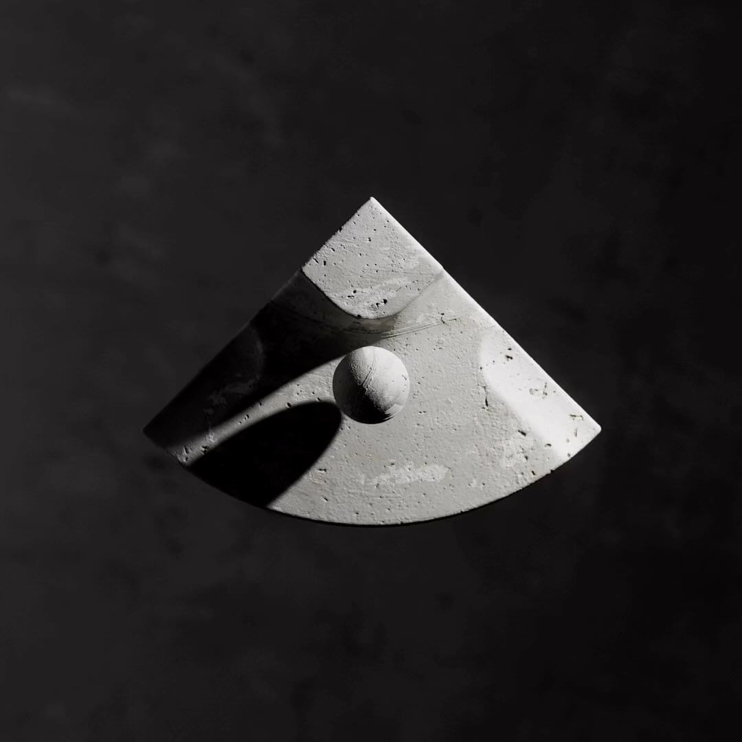 Abstract composition featuring a textured triangular surface in varying gray tones, illuminated by dramatic lighting with a spherical object.