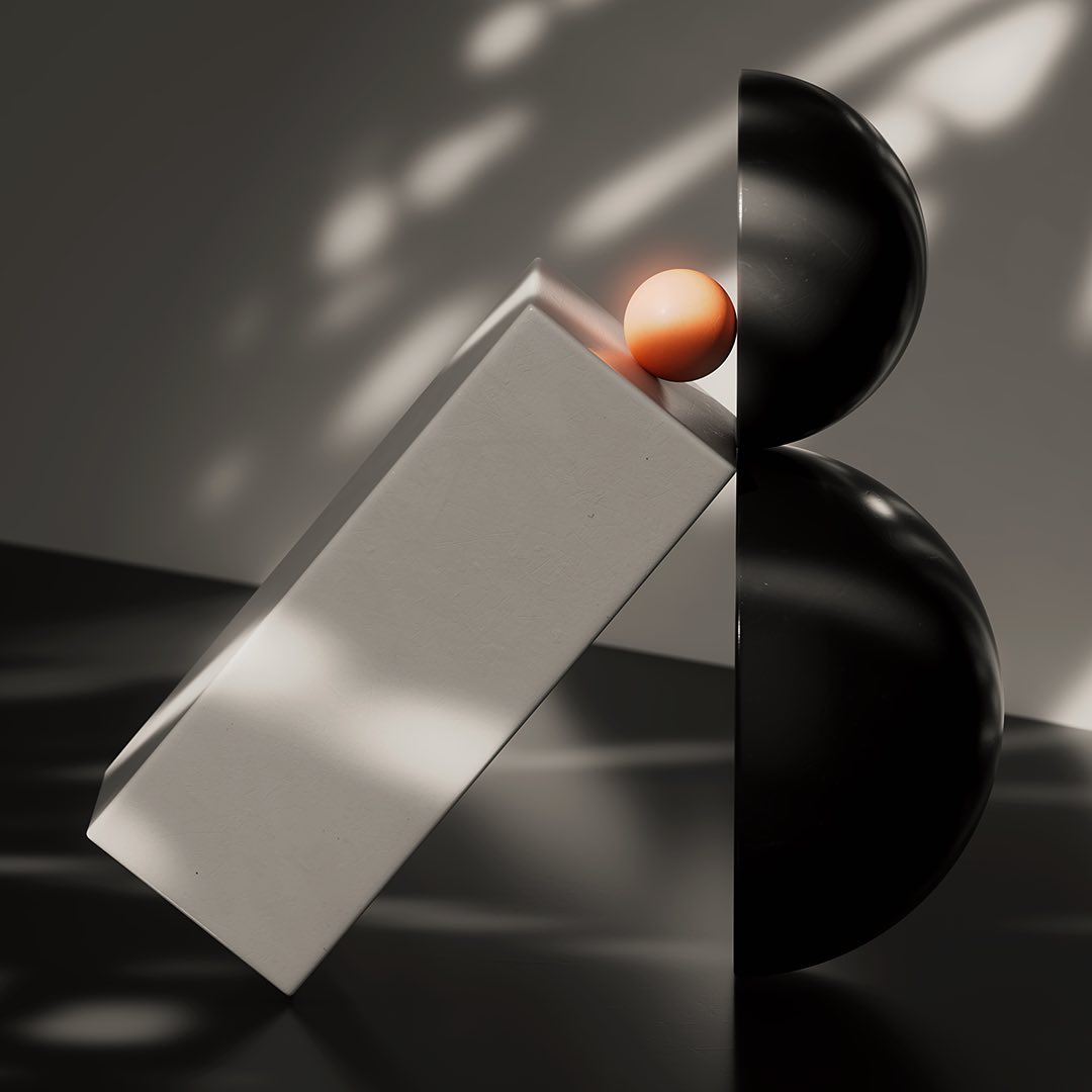 Abstract still life featuring stacked black spheres, a beige block, and a small orange sphere, set against a grey backdrop with lighting effects.
