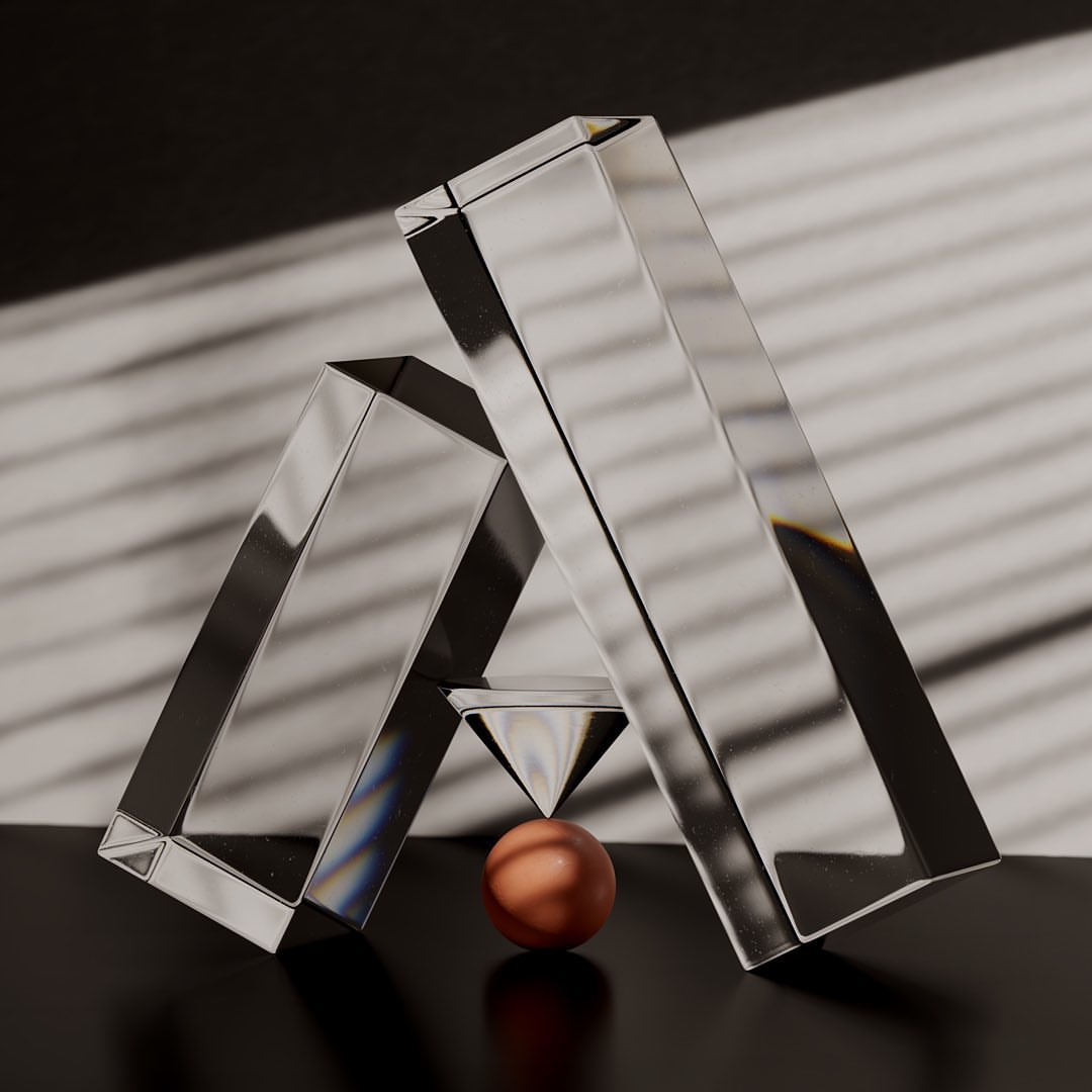 Abstract still life with geometric glass prisms and a sphere on a dark surface with window shade shadows in the background.