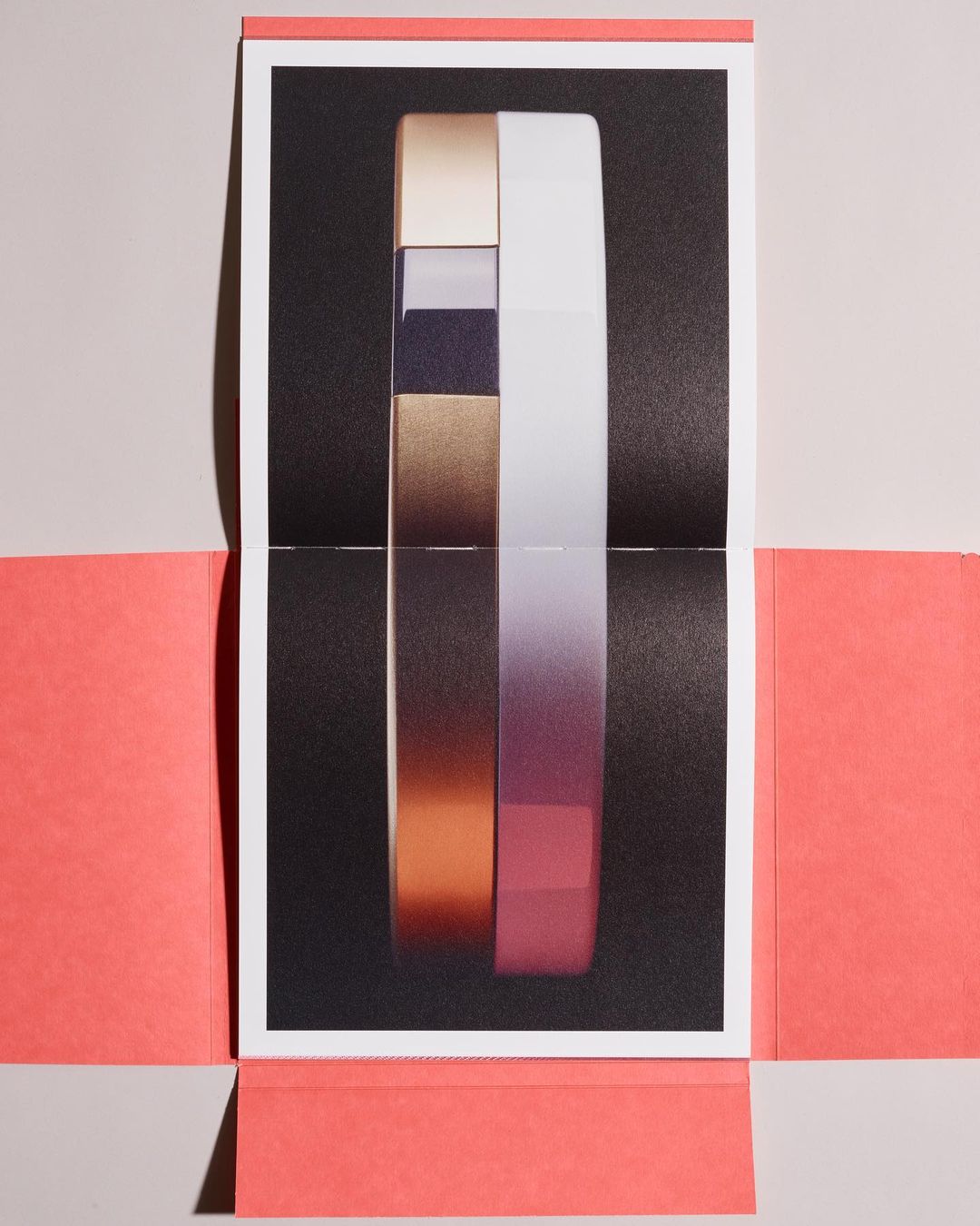 Abstract studio shot of layered translucent and solid color blocks. Soft lighting creates depth, showcasing a minimalist aesthetic.