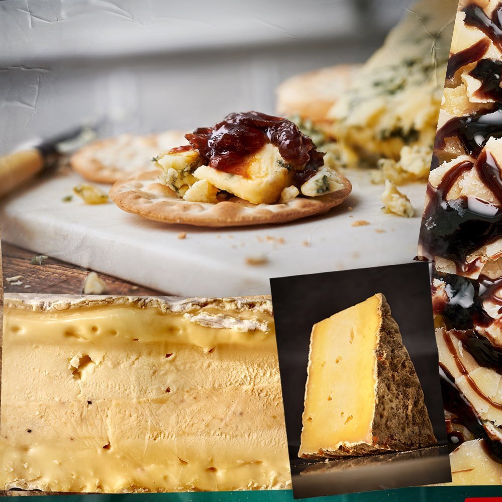 Close-up of assorted cheeses, including blue cheese on crackers, cheddar, and soft cheese with syrup, ideal for food photography.