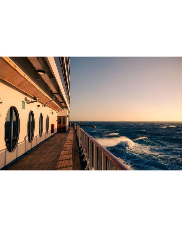 Exterior of a cruise ship sailing on the ocean, with waves and a clear horizon at sunset. Shot from the ship's deck with railings.