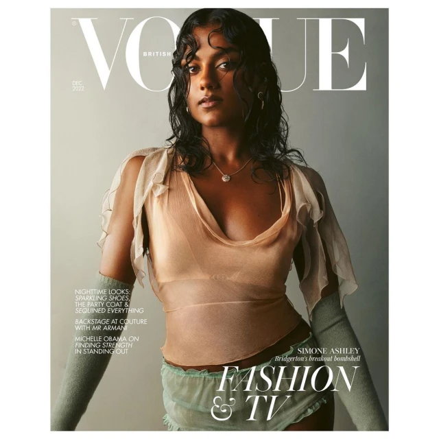 British Vogue cover featuring Simone Ashley in sheer top and arm warmers. 'Fashion & TV' text overlay. Neutral background. December 2022 issue.