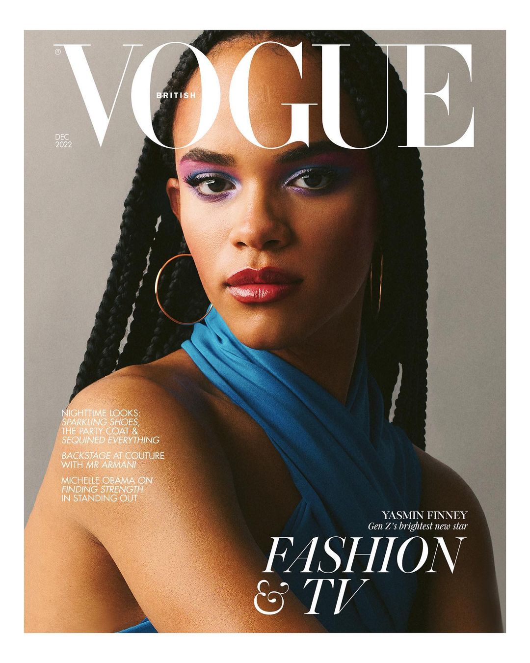 Vogue cover featuring Yasmin Finney, showcasing a close-up portrait with purple eyeshadow, gold hoop earrings, and a turquoise top.