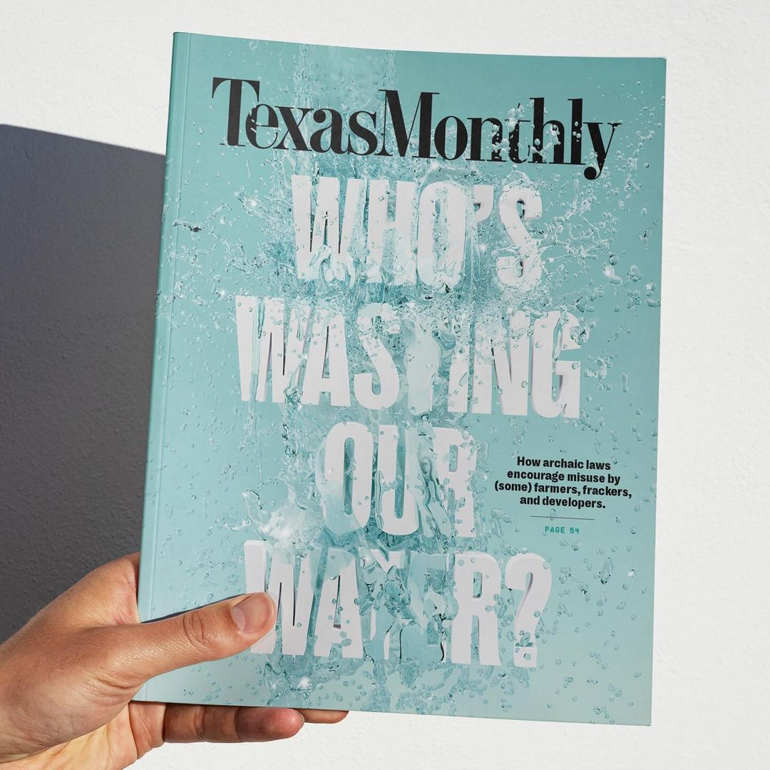 Hand holds 'Texas Monthly' magazine with cover headline 'Who's Wasting Our Water?' in white letters and water droplet graphics.