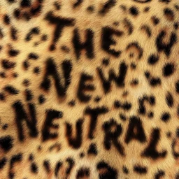 Close-up of animal print fur texture with the text The New Neutral formed in dark spots.
