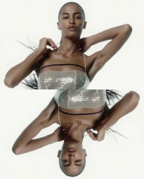 Symmetrical mirrored portrait of a woman with dark hair wearing a sparkly sequin bandeau top against a plain white background.