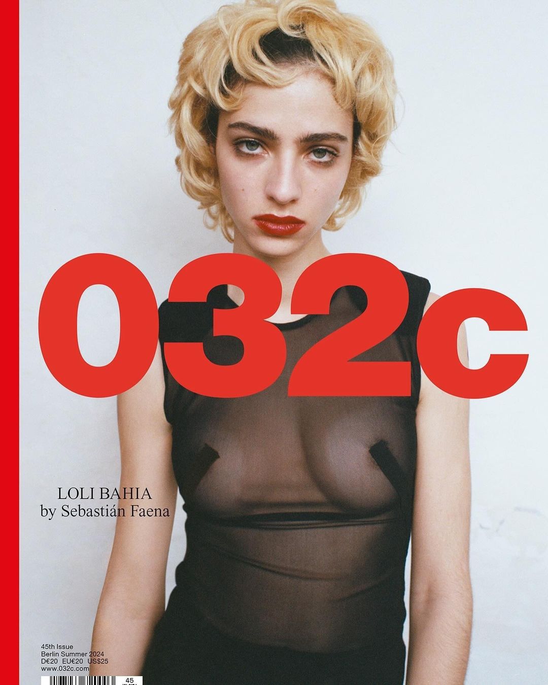 Close-up portrait of a young woman with blonde curly hair, red lipstick, and a sheer top posing in front of a white background and red text.