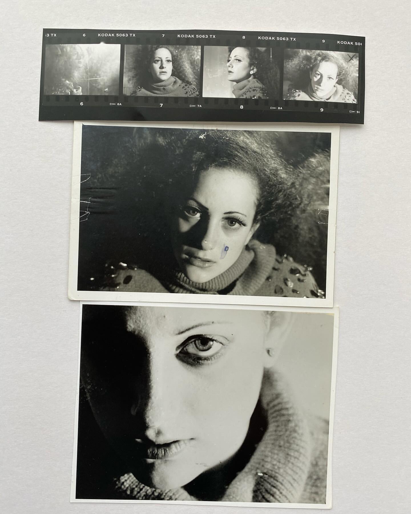 Black and white photograph of a woman's face in two portrait prints, and a strip of film with four images of the same person.