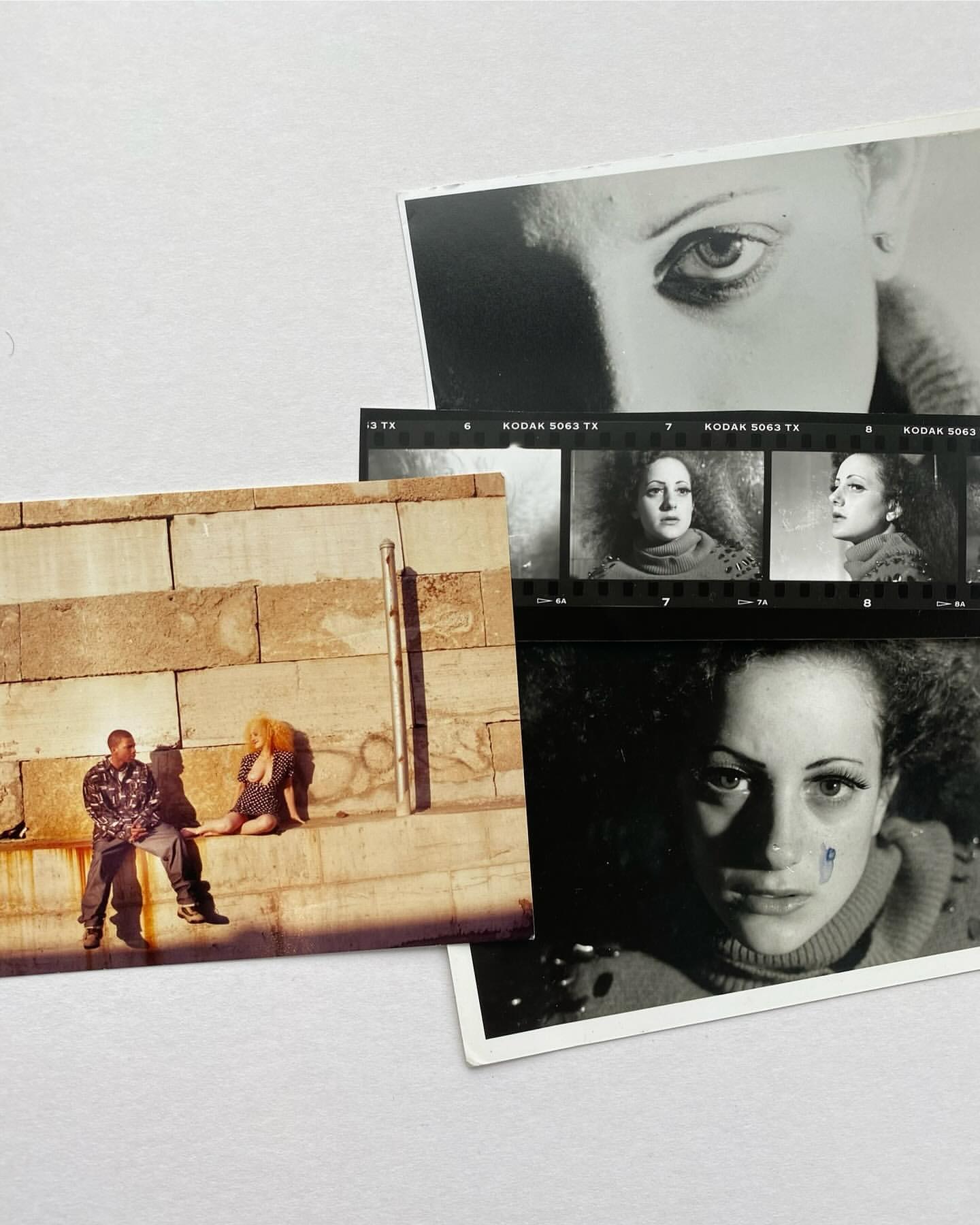 Collage of color and black and white photographs featuring portraits, a couple sitting on a wall, and film strips on a white background.