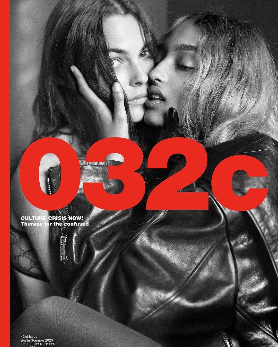 Magazine cover featuring two women in close contact, one resting her hand on the other's face, with '032c' in large red text.