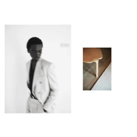 Portrait of a Black man in a light suit jacket and dark shirt, paired with a small inset image of wooden furniture