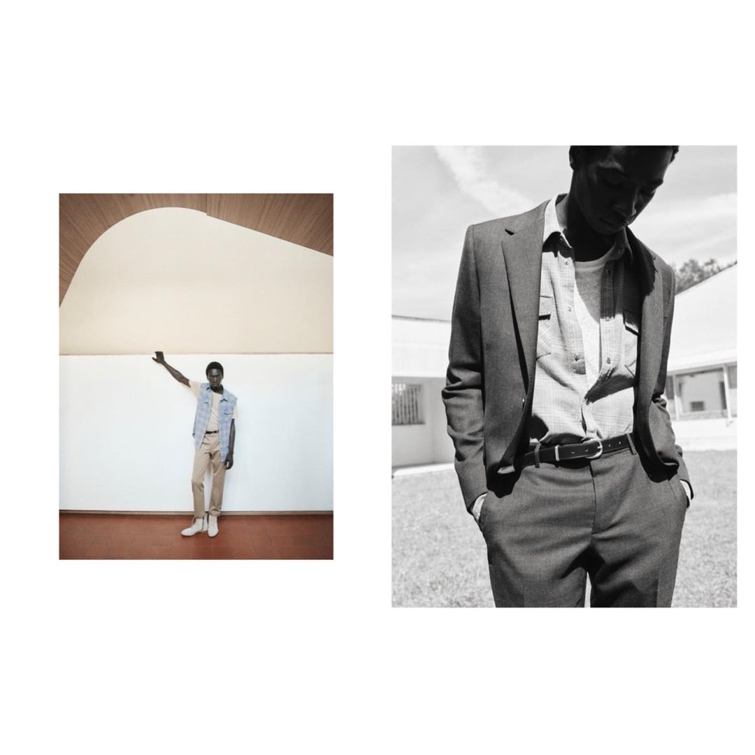 Black man in a tailored suit and collared shirt photographed outdoors in black and white by Sebastien Giraud.