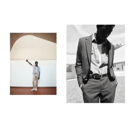 Black man in a tailored suit and collared shirt photographed outdoors in black and white by Sebastien Giraud.