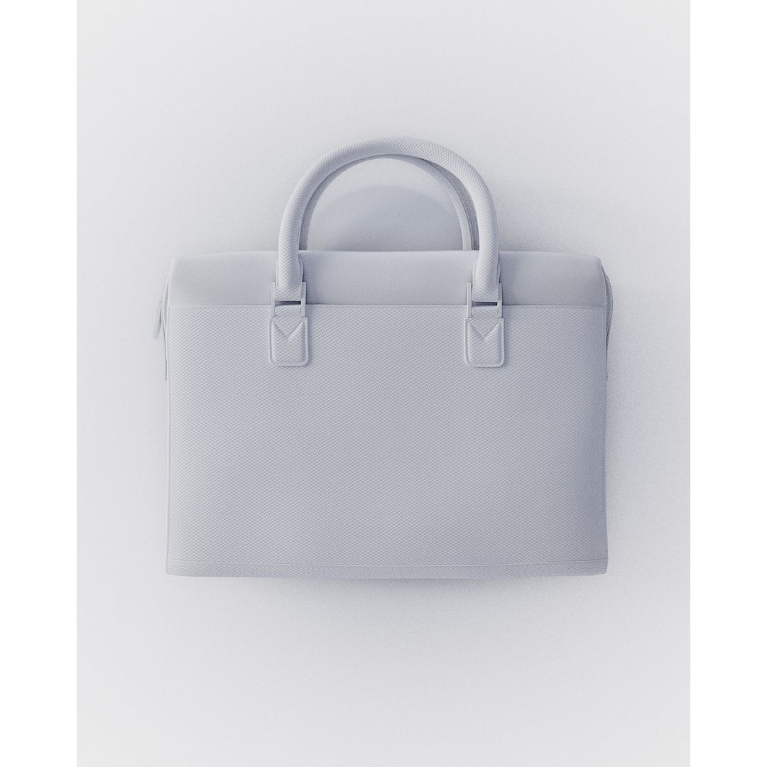 Close-up studio shot of a light gray leather laptop bag with matching handles against a white background, emphasizing sleek design.