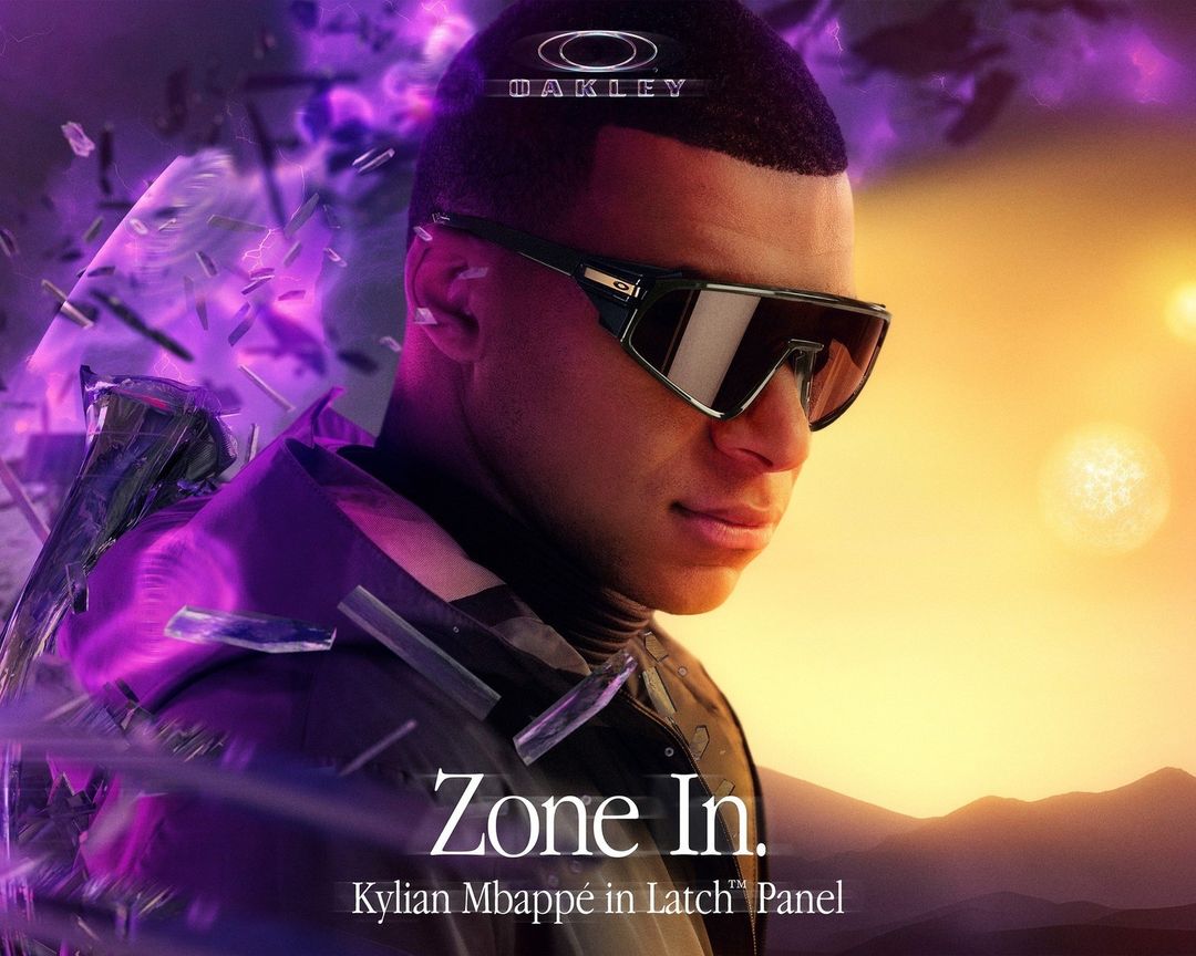 A man wearing black sunglasses, styled in a futuristic fashion with purple hues, promoting Oakley eyewear, set against a blended background.
